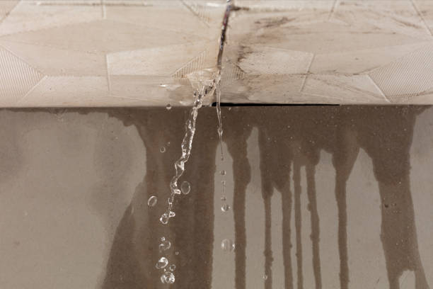 Professional Flood Damage Cleanup technician working in Delano, CA